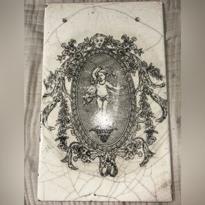 Antique Painted Porcelain Tile. 15.75x10” with holes for hanging.